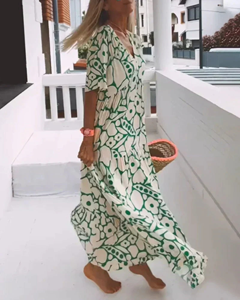 CHRISTINE | Lange Zomerjurk met Vloeiende Snit en Elegante Grafische Motief