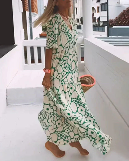 CHRISTINE | Lange Zomerjurk met Vloeiende Snit en Elegante Grafische Motief