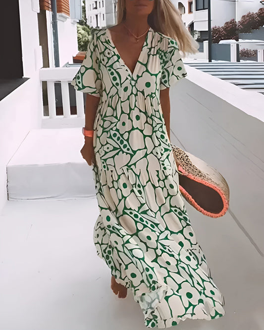 CHRISTINE | Lange Zomerjurk met Vloeiende Snit en Elegante Grafische Motief